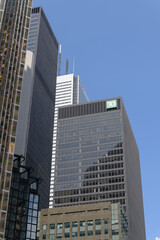 Fototapeta premium TD corporate logo sign on the exterior of a tower at the Toronto Dominion Centre complex (looking north on Bay St south of King St W)