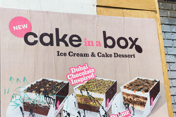 Fototapeta premium street poster in Toronto (Baskin-Robbins 'cake in a box' promotion)