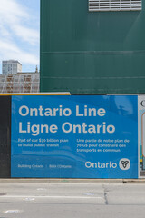 Fototapeta premium Ontario Line sign at the future Osgoode subway station at northeast corner of University Av and Queen St W, Toronto