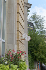 Fototapeta premium wall mounted projecting sign outside Summerhill MD, a medical spa, located at 1176 Yonge St, Toronto