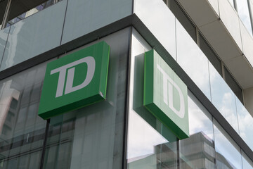 Fototapeta premium signs outside Toronto Dominon bank branch at 2 St Clair Av E in Toronto