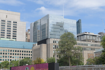 Fototapeta premium looking northeast on University Av to Ontario Court of Justice (glass building at center) and 361 University Avenue Courthouse (stone building bottom), Toronto