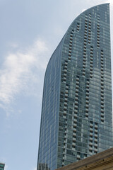 Fototapeta premium west elevation of L-Tower, designed by Daniel Libeskind (Page + Steele, IBI Group), a residential condominium tower, located at 8 The Esplanade, completed 2015 in Toronto