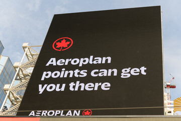 Fototapeta premium Air Canada Aeroplan loyalty program digital advertising at Sankofa Square, Toronto
