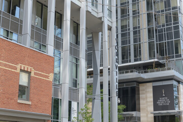 Fototapeta premium facade of buildings: 1 Yorkville, a condominium complex, and 11 Yorkville Condo in Toronto