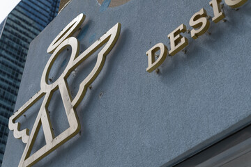 Fototapeta premium detail of building exterior and sign of VaVa Designer Cakes located at 620 Yonge St, Toronto