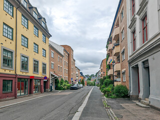 Fototapeta premium Quiet residential street of classic Scandinavian neighborhood