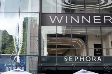 Fototapeta premium glass facade with signs of Winners and Sephora at Yonge Eglinton Centre, 2300 Yonge St, Toronto