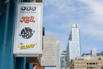 Fototapeta premium box sign outside 496 Yonge St (555 Boat Noodles, Kati, Hi Hoi Tod, The Gluay), a Thai culinary mini-market, Toronto