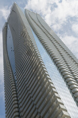 Fototapeta premium an upward view of One Bloor East designed by Hariri Pontarini Architects, a mixed-use commercial and residential tower at Yonge St, Toronto