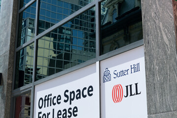 Fototapeta premium Office Space For Lease sign of Sutter Hill, a real estate owner, developer, and property manager in Toronto