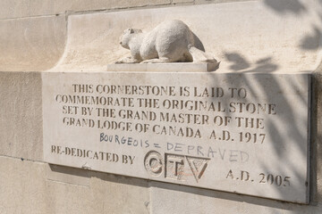 Fototapeta premium cornerstone dedication plaque with inscription at The Masonic Temple, designed by William F Sparling, completed 1918, and located at 888 Yonge St, Toronto