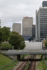 Fototapeta premium outdoor subway tracks west of Yonge St with view of office towers at Yonge and Eglinton: RIO CAN, Heart and Stroke Foundation (2300 Yonge St, Yonge Eglinton Centre), toronto