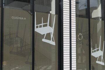 Fototapeta premium window mesh covering at Cucina Buca, a restaurant, located at 2 St Clair Av W (Regus St Clair), Toronto