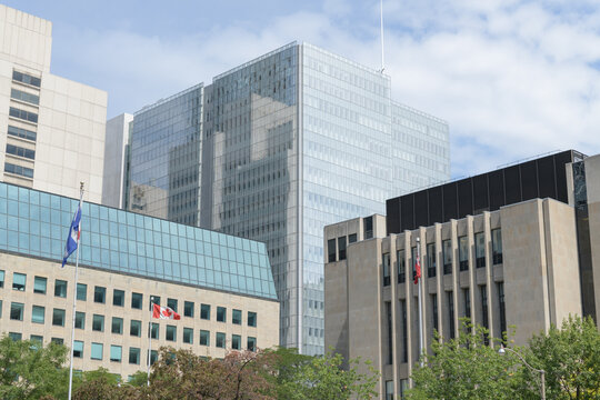 view of Ontario Court of Justice, at 10 Armoury Street, immediately north of City Hall (glass building at center), Toronto (designed by Renzo Piano, 2023)