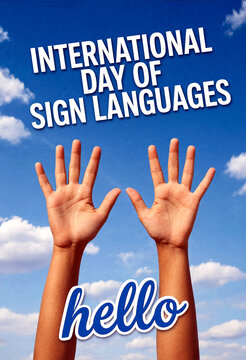 Two hands raised towards the sky with hello sign for international day of sign languages celebration