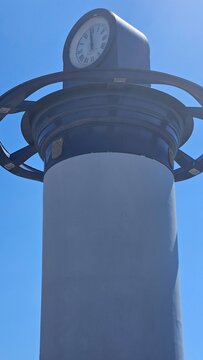 Vintage Clock Tower Under Clear Blue Sky