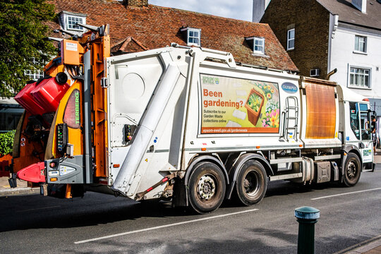Council Ten Wheel Refuse Collection Truck Driving On Public Road