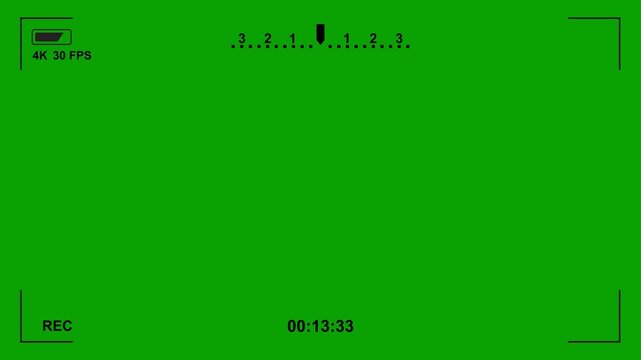 4K camera viewfinder with a green background.