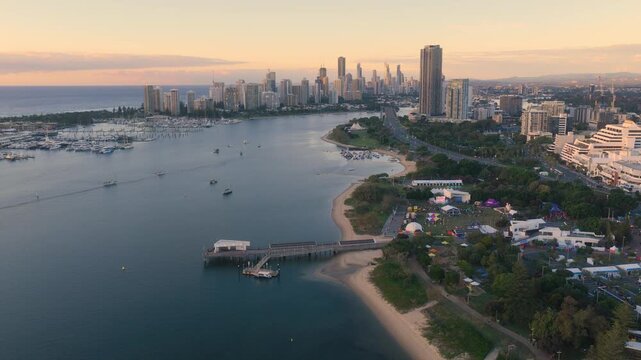 Horizontal aerial footage dollying forward over Southport, Surfers Paradise and the Gold Coast Marathon, Queensland, Australia