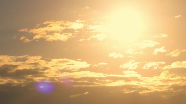 Horizontal aerial footage trucking right as a light aircraft flies across the golden sunset sky above Southport and Surfers Paradise, Queensland, Australia