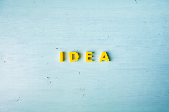 Creative idea and innovation concept with yellow letters and copy space