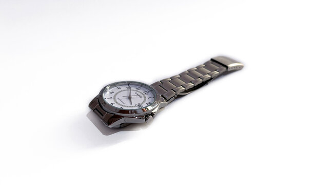 Kediri, East Java, Indonesia &ndash; August 16, 2026: Metallic Wristwatch with Dark Dial Photographed in Multiple Angles