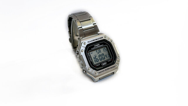 Kediri, East Java, Indonesia &ndash; August 16, 2026: Metallic Wristwatch with Rectangular Digital Face and Perforated Band Photographed on White Background