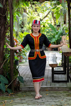 Close up portrait of Malaysian indigenous Dayak woman from Sarawak in Bidayuh traditional costume