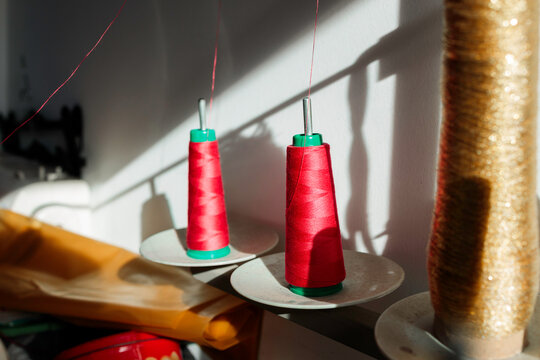 Cones of colorful textile thread