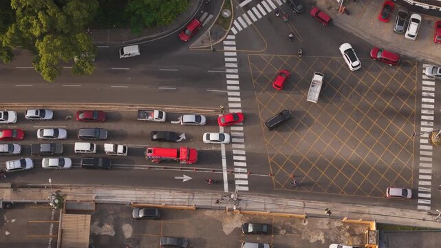 Aerial view of traffic at the Avenida de los Proceres intersection with vehicles moving through the city streets in Santo Domingo, Distrito Nacional, Dominican Republic.