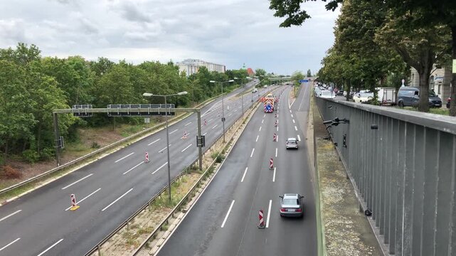 Traffic management trailer with illuminated arrow on Berlin A100 motorway