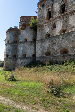 Ancient round bastion and ruined stone palace walls of Medzhybizh fortress
