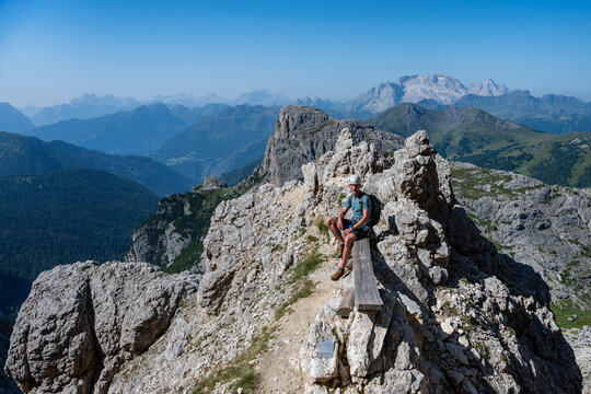 A man on the way to Monte Lagazuoi Piccolo. Alps, Dolomites, Italy.