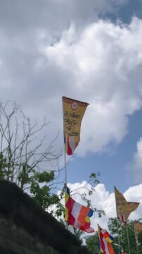 Buddhist Flag and Sri Lankan National Emblem at Sri Dalada Maligawa in Kandy