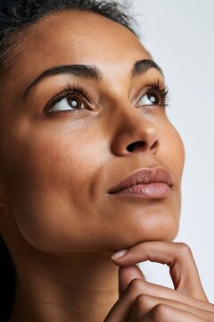 Woman thinking and contemplating future with hope