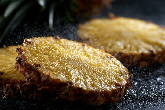 Pineapple slices with water drops refreshing tropical fruit