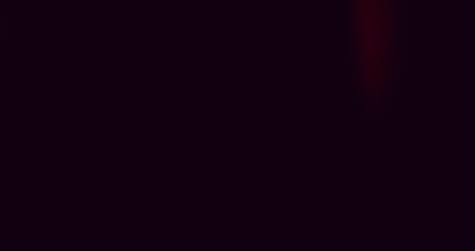 Cinematic moving lens flare overlay in super slow motion featuring glow, soft optical reflections and realistic lens artifacts on a black background. Premium VFX element for compositing.