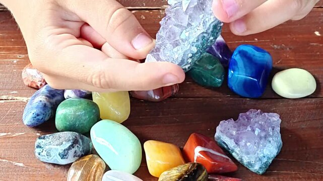 Natural minerals in hand. Semi-precious multi-colored stones, minerals close-up. Mineralogy. Collection of minerals.	