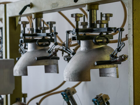 Metal stainless steel equipment for treating hat material.
