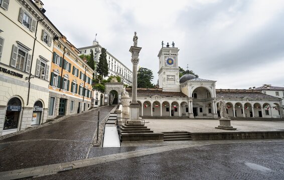 Piazza della Libert&agrave; main square with Loggia e Tempietto di San Giovanni and clock tower, Castello di Udine in the back, old town, Udine, Friuli-Venezia Giulia, Italy