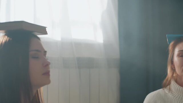 Young caucasian woman balancing book on head near bright window, participating in duet coaching session, closed eyes, focused breathwork for speech and diction, modern home workshop, confident poise