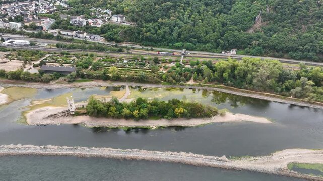 Rhine River nearby Bingen, Germany - Visible rocks and sandbars due to extraordinary low water level after a long period of drought