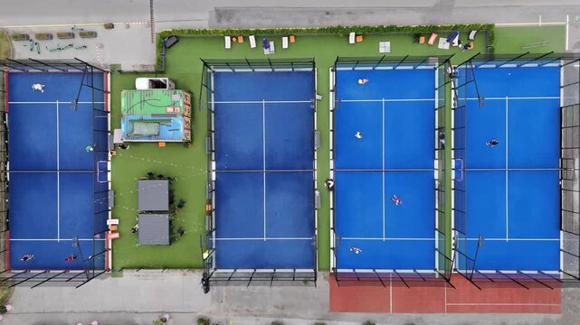 Top Down Aerial Video of People Playing Outdoor Padel Tennis