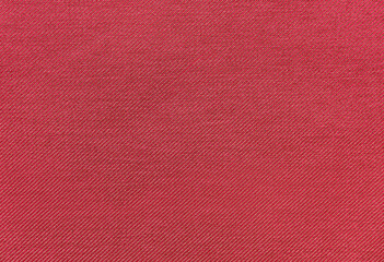 Close-up Texture of Red Woven Fabric with Diagonal Twill Weave Pattern © Desainku