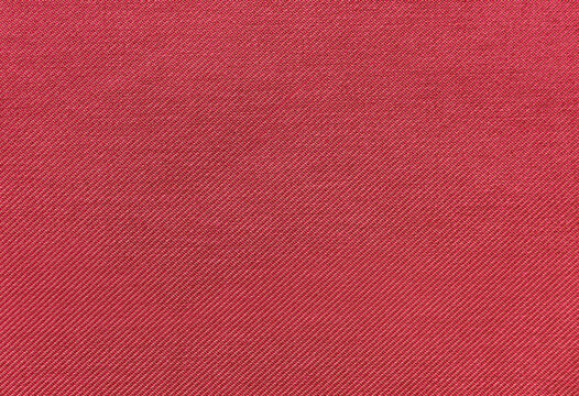 Close-up Texture of Red Woven Fabric with Diagonal Twill Weave Pattern