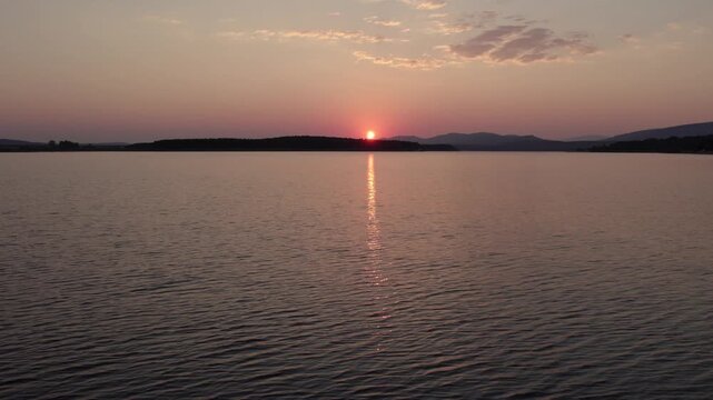 Total solar eclipse sunset over Cuerda del Pozo Reservoir, Spain