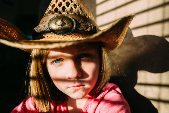Moody Portrait of a Girl in Cowboy Hat