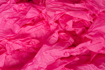 Fototapeta premium Pink and blue latex sterile medical gloves as a background.