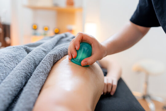 Osteopathy massage treatment with cupping therapy at clinic